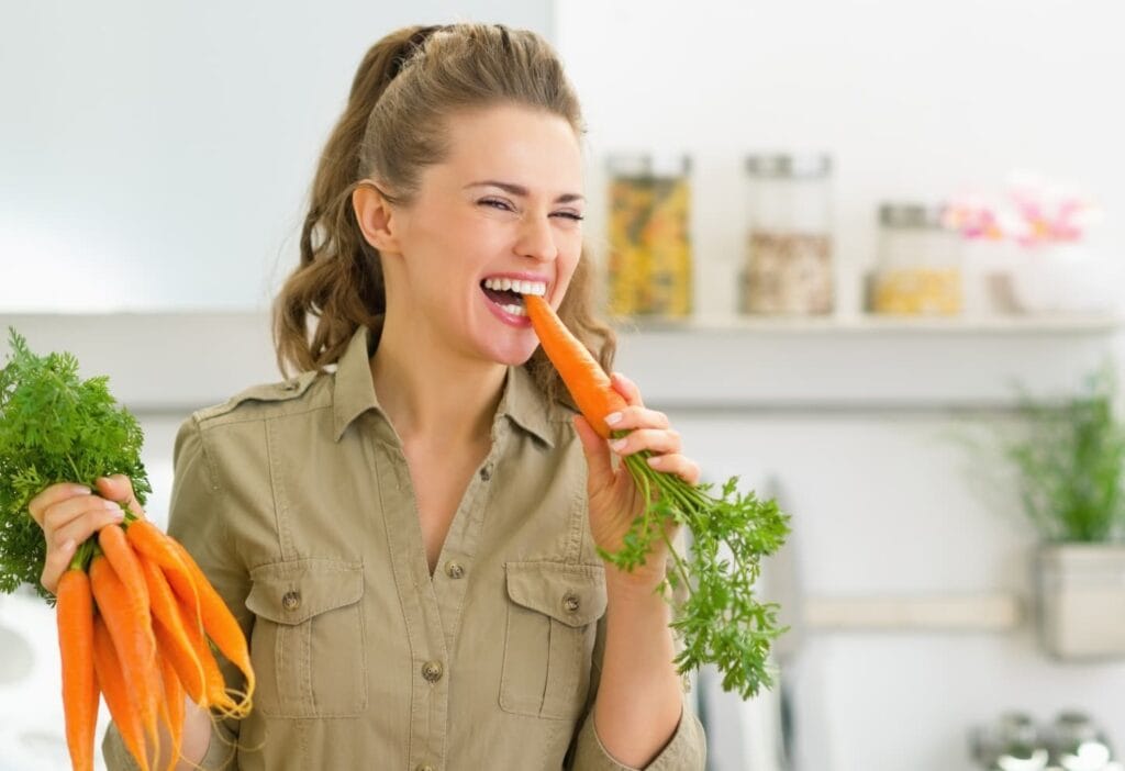 woman eating carrots