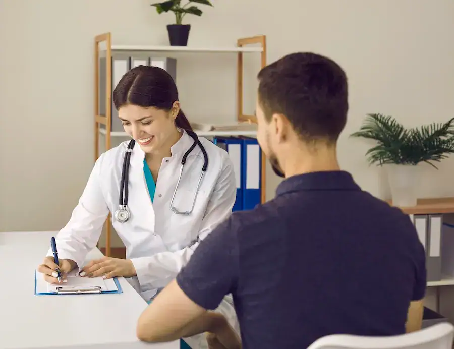 man getting physical examination