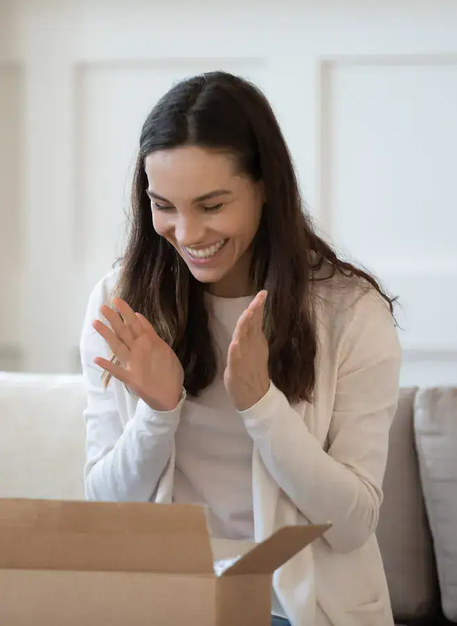 woman receiving large package